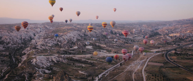 hot-air-balloon-fly-along-the-clouds-1.jpg